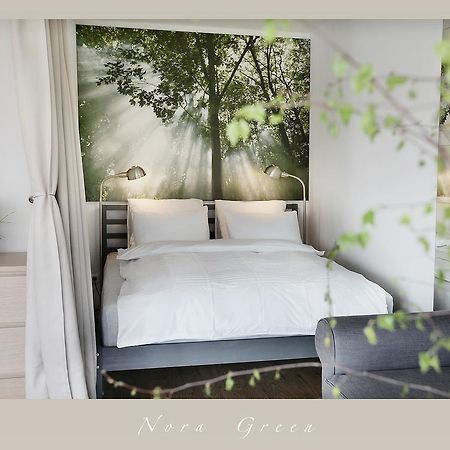 Nora Green Nida Rum bild