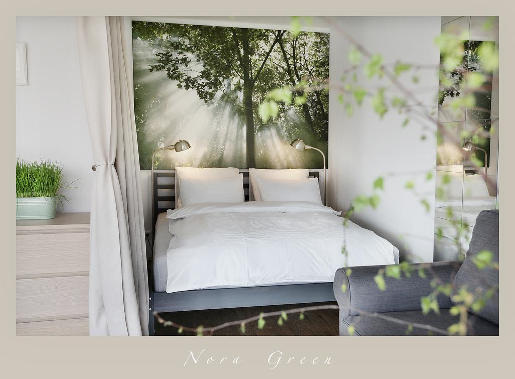 Nora Green Nida Rum bild